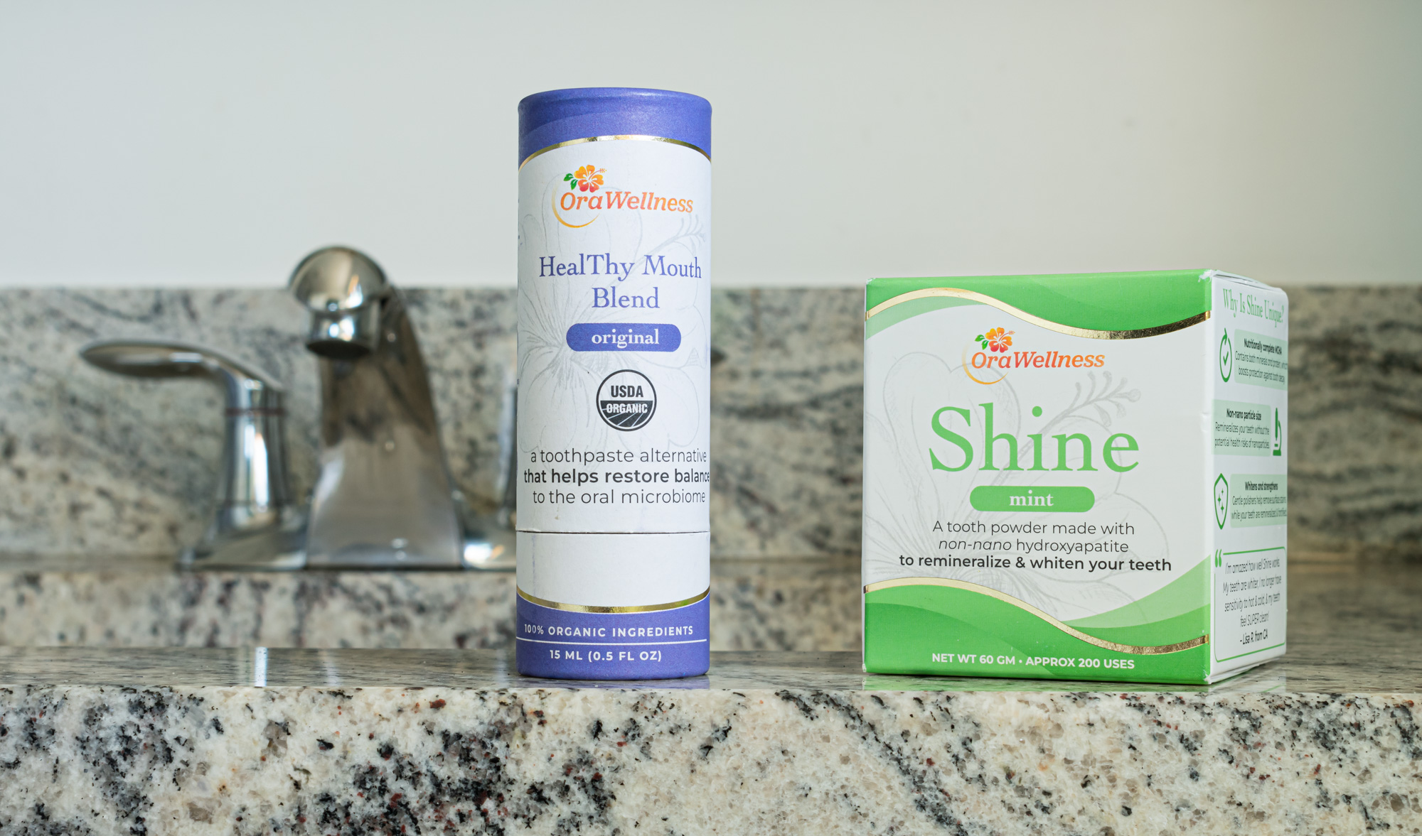 OraWellness HealThy Mouth Blend and OraWellness Shine on a bathroom countertop